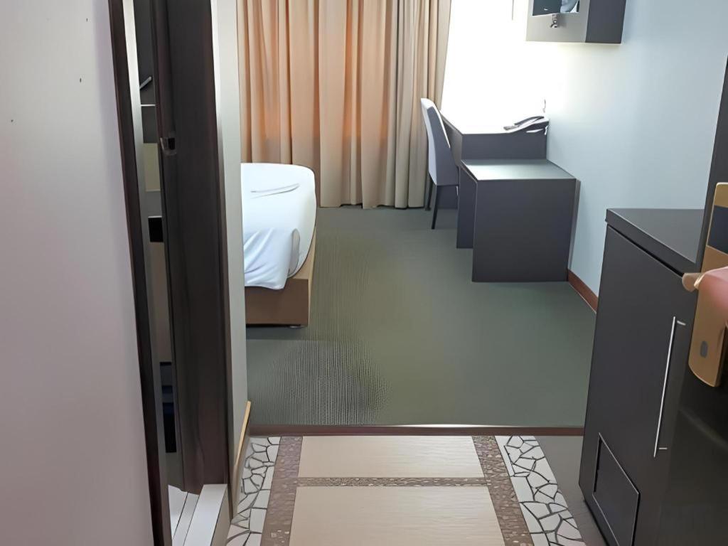 900 Inn Бинтулу Экстерьер фото